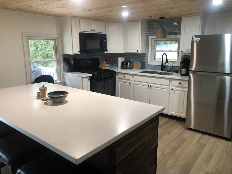 Kitchen with large bar and prep area.
