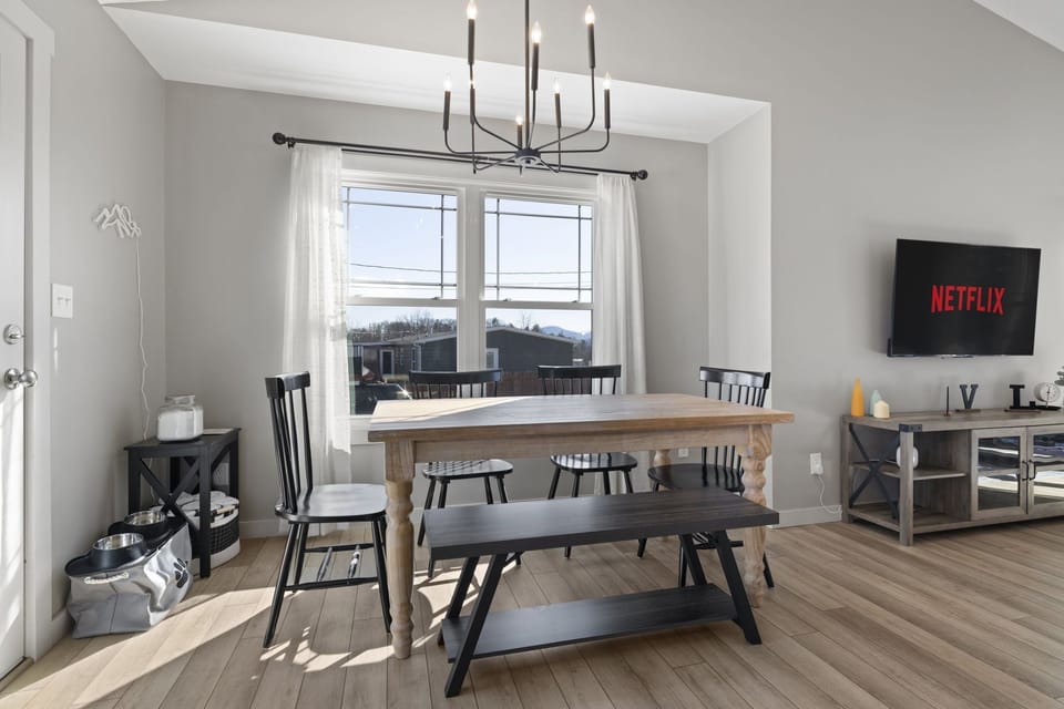 The dining table has room for 6 people. Prefer outdoor seating? No problem! Step out the back door onto the newly expanded deck and eat outside while taking in the stunning mountain views!