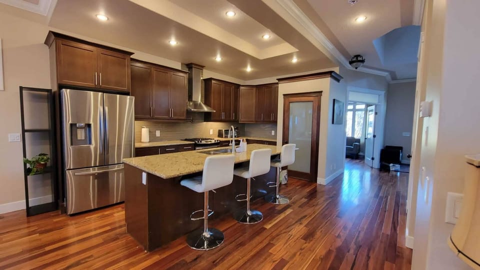A fully equipped kitchen featuring all essential appliances, cookware, utensils
