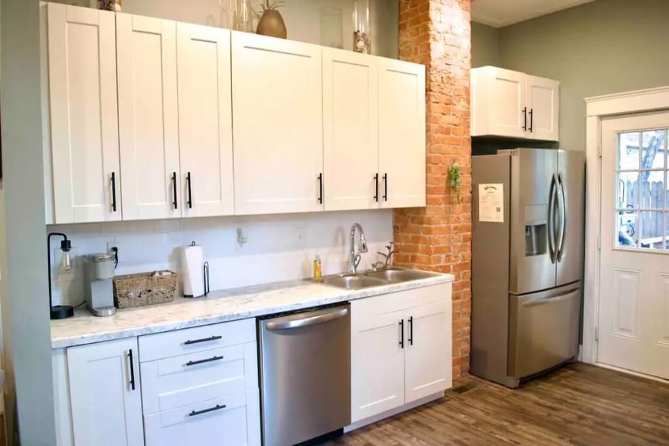 Beautifully updated well appointed kitchen - well stocked with everything needed