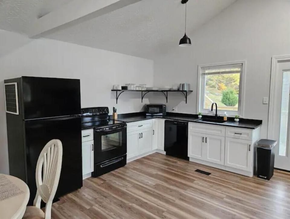 Refrigerator/freezer, range, microwave, dishwasher, K-cup coffee maker