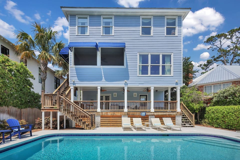 Screened-in porch, covered porch and poolside seating