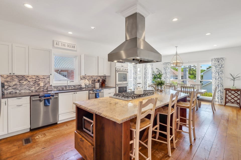 Spacious kitchen with seating for four at the island