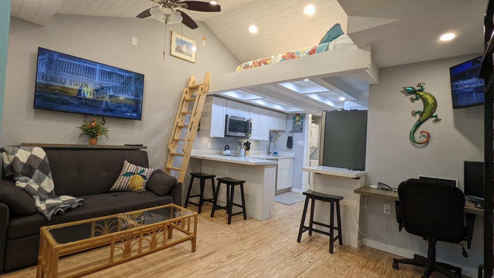 couch, coffe table and dining area