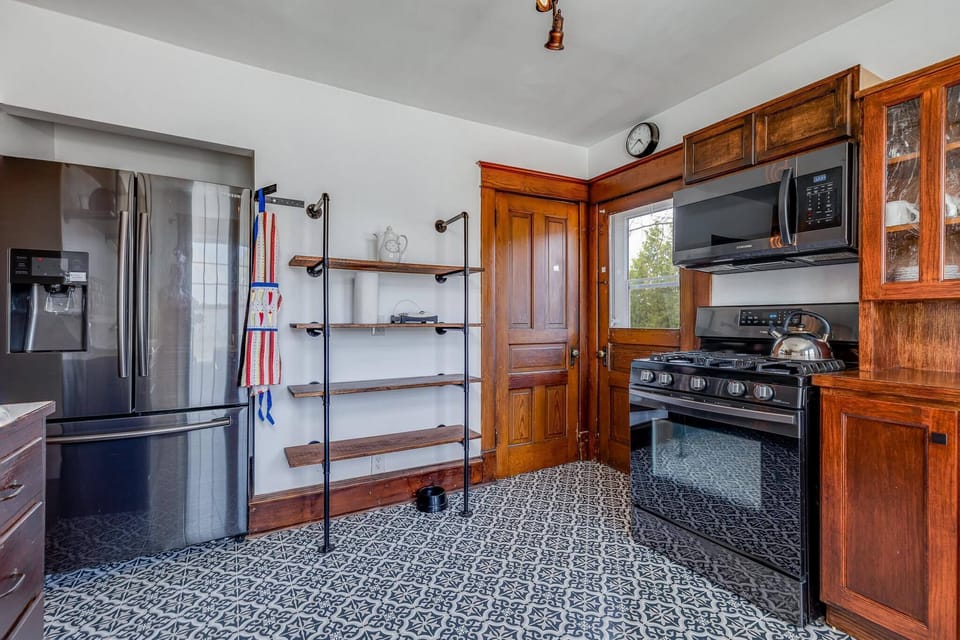 Updated refrigerator, stove and microwave.