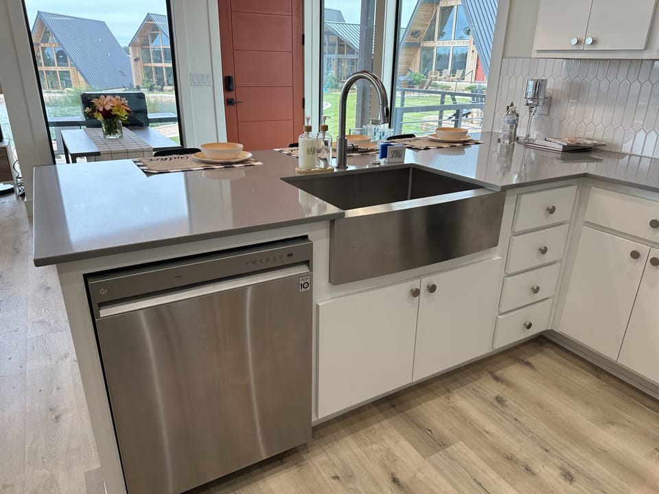 Modern farmhouse kitchen with stainless steel appliances