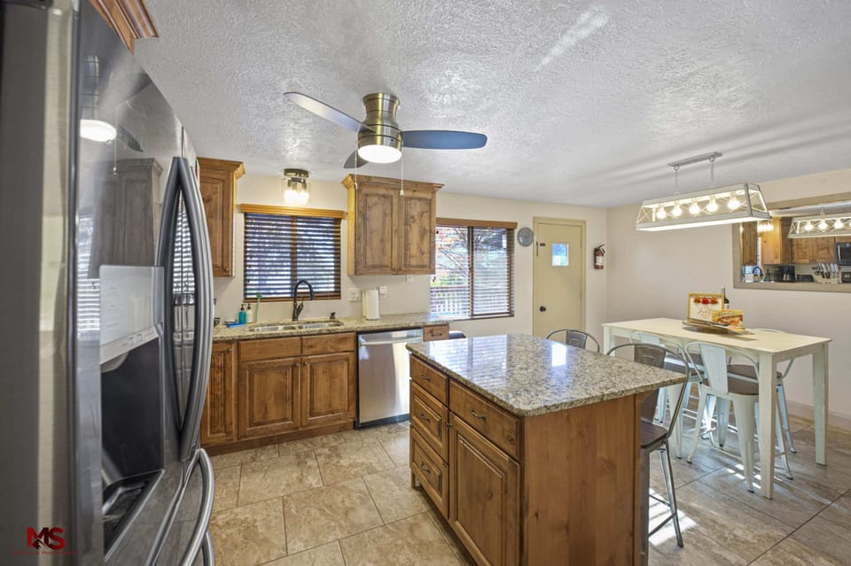 Enjoy home-cooked goodness with our fully-equipped kitchen featuring new Samsung appliances.