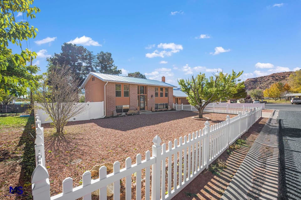 Immerse yourself in the heart of Kanab with this spacious split-level home. Enjoy the City park, downtown shops, and if you come during 4th of July, a spectacular fireworks show!