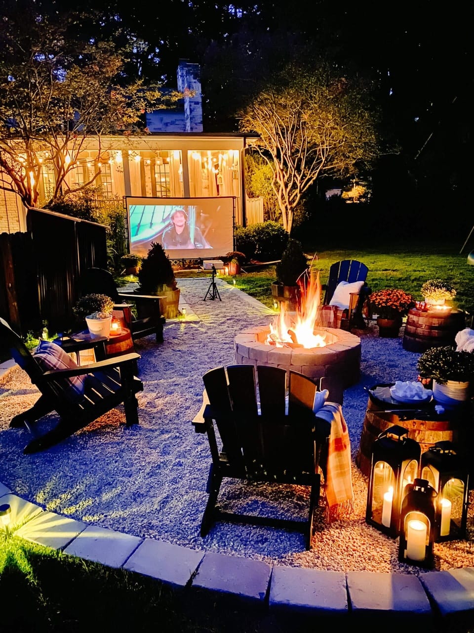 Outdoor movie set up in front of the fire pit (additional add on fee)
