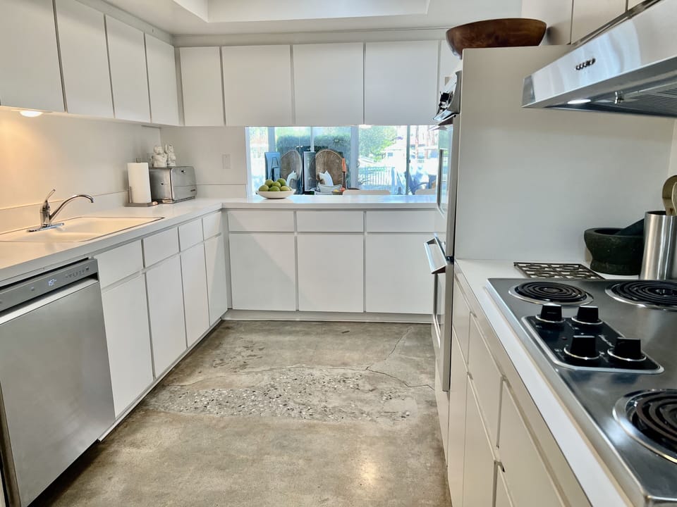 Kitchen with original cabinets.
New LG fridge and diswasher.