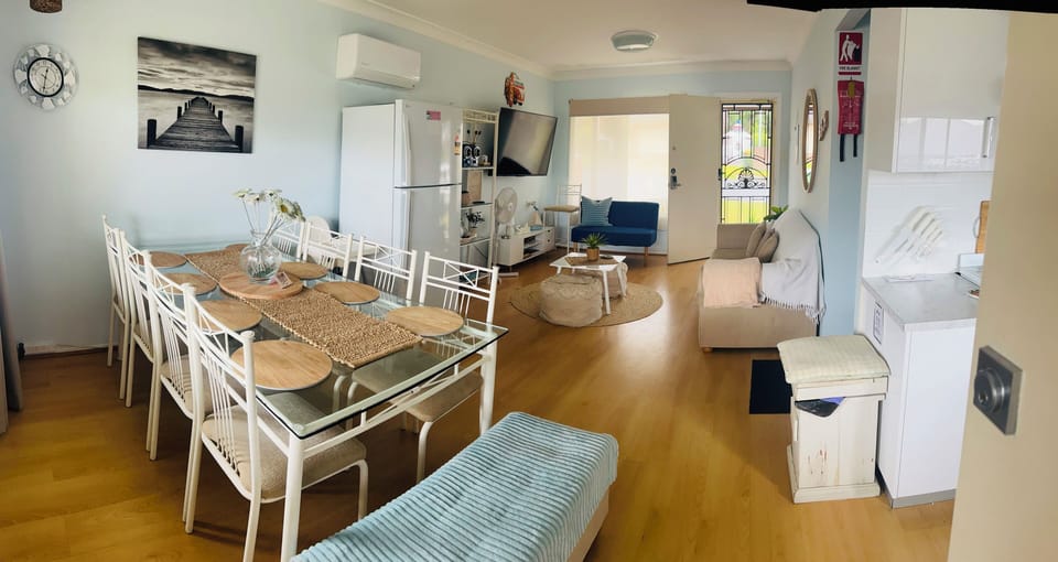 Open living , combined dining/living fully equipped with all your needs 
