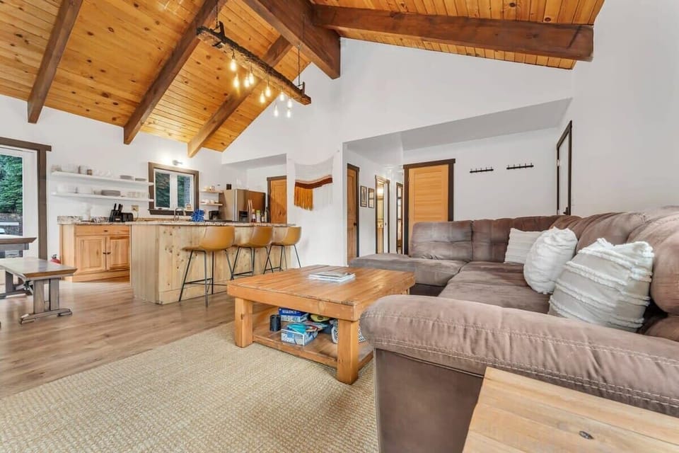 Seamlessly connected to the living room is the kitchen and dining area.