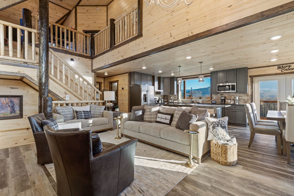 Wall-to-wall windows bring the outdoors in for family bonding moments.
