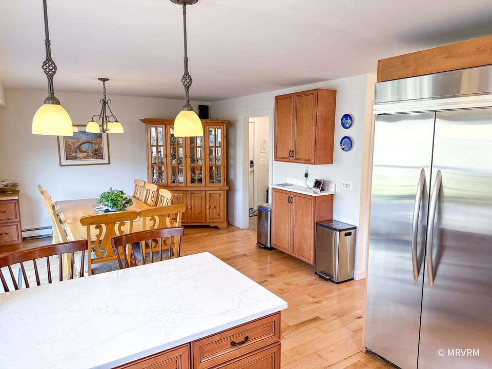 View of dining room from the kitchen. Open floor plan