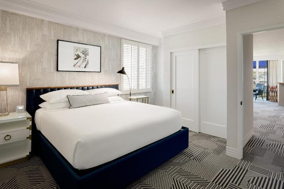 Sink into a cloud-soft bed beneath calming, natural light.