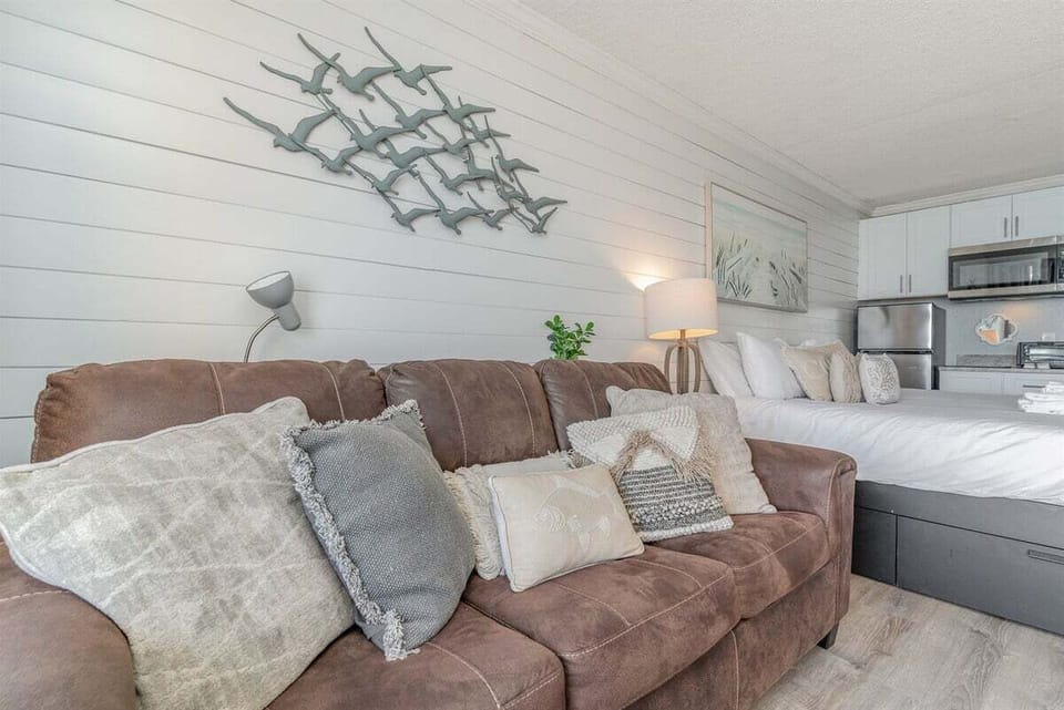 Relax on the comfy sofa, which also pulls out into a queen-size bed.