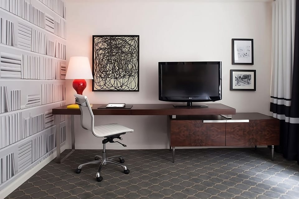 Settle in and focus easily at the sleek work desk.