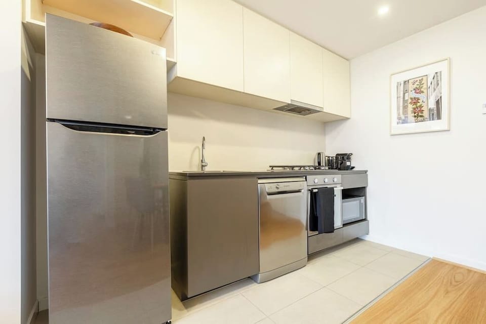 Cook your favorite meals in this fully - equipped kitchen..