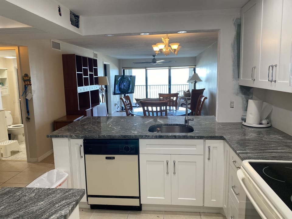 View from Kitchen,  prepare your meals while looking at the beach or TV