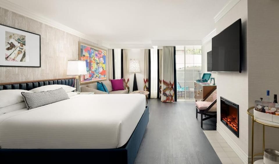 Unwind by the fireplace after sunlit balcony mornings.