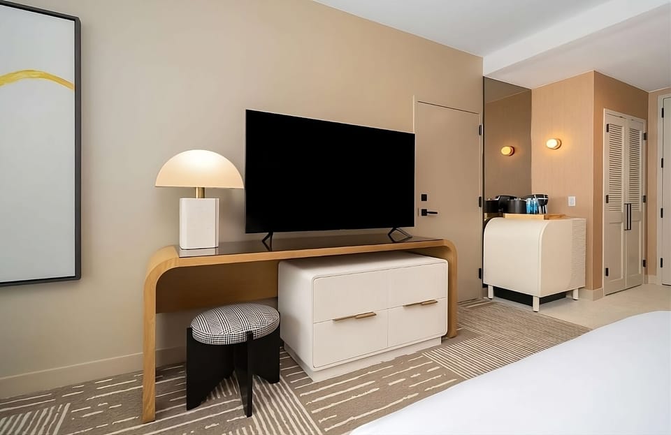 Enjoy effortless downtime with smart storage and in-room coffee.