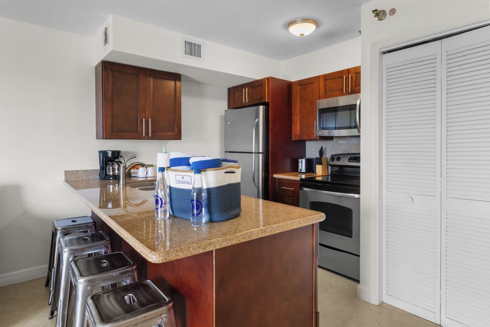 Gather for easy breakfasts around the granite island seating.