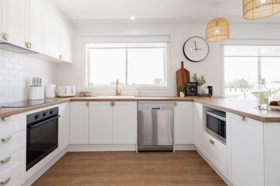 Open plan kitchen with oven, stove, dishwasher fridge freezer and everything you need to prepare and entertain for all your guests and time away