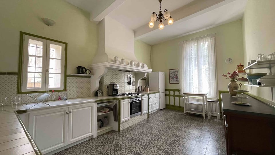 Large kitchen with two fridges and industry grade dish washer