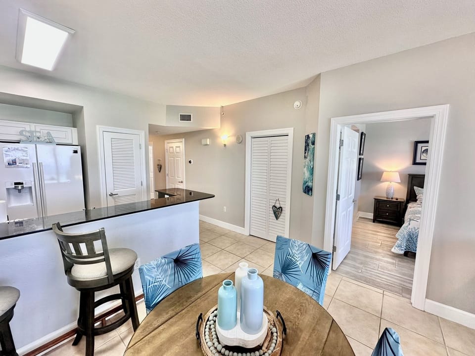 Dining area with coastal touches and light-filled space