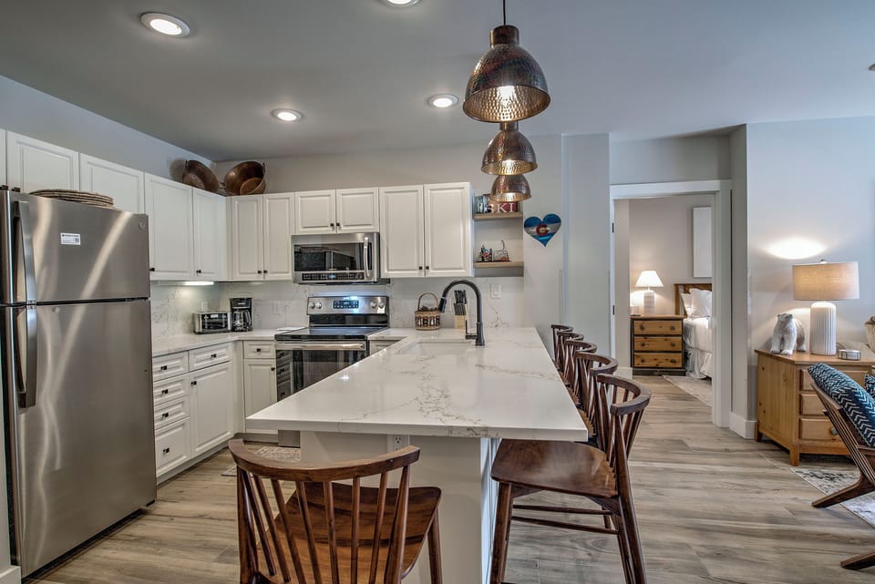 Full kitchen with seating for 6.