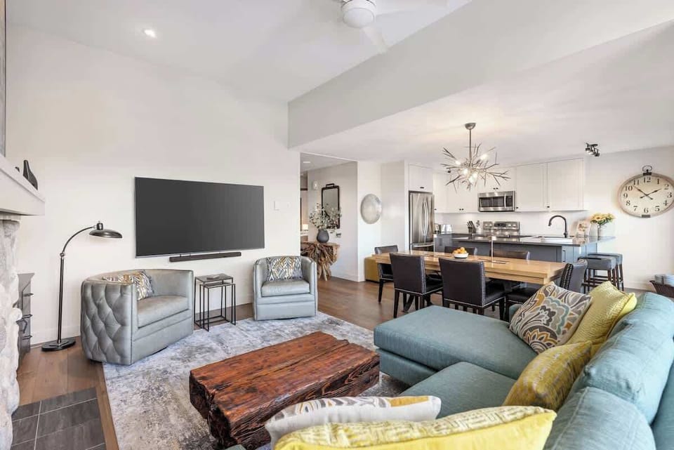Sofa Bed- Enjoy open-concept living with mountain views and modern alpine décor  
- Cozy up by the stone fireplace or stream your favorite shows on the flat-screen TV  
- Perfect gathering space for après-ski relaxation and memorable evenings  