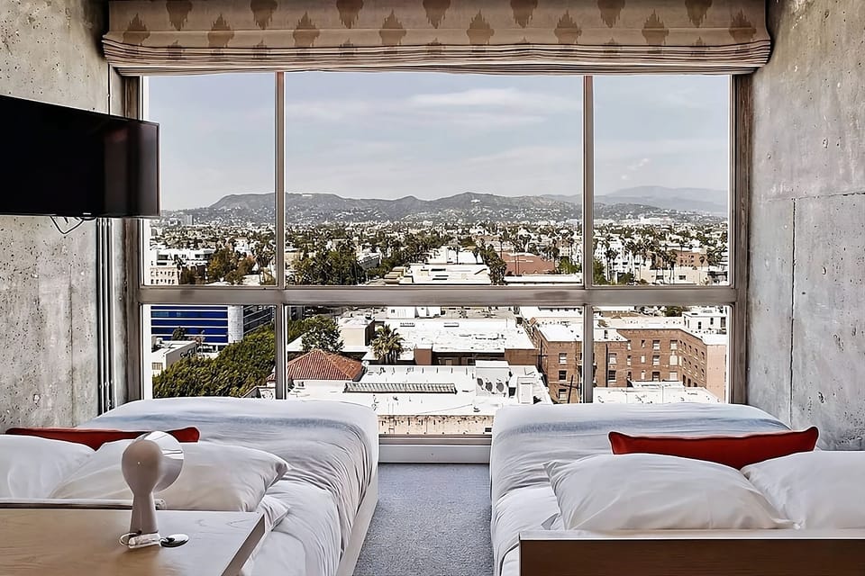 Wake refreshed with twin beds and a wall of views.