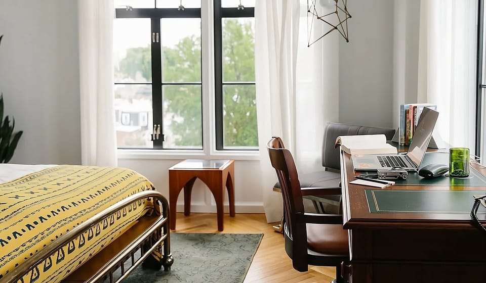 Settle in and focus with a bright desk by windows.