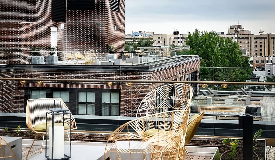 Sip cocktails on the rooftop with breezy lounge seating.