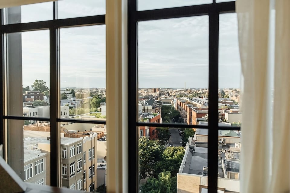 Gaze out over rooftops and treetops from lofty windows.