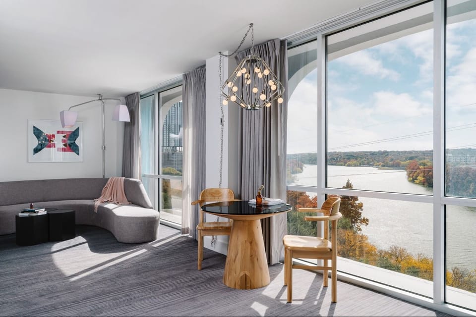 Sip morning coffee beside floor-to-ceiling windows and water.