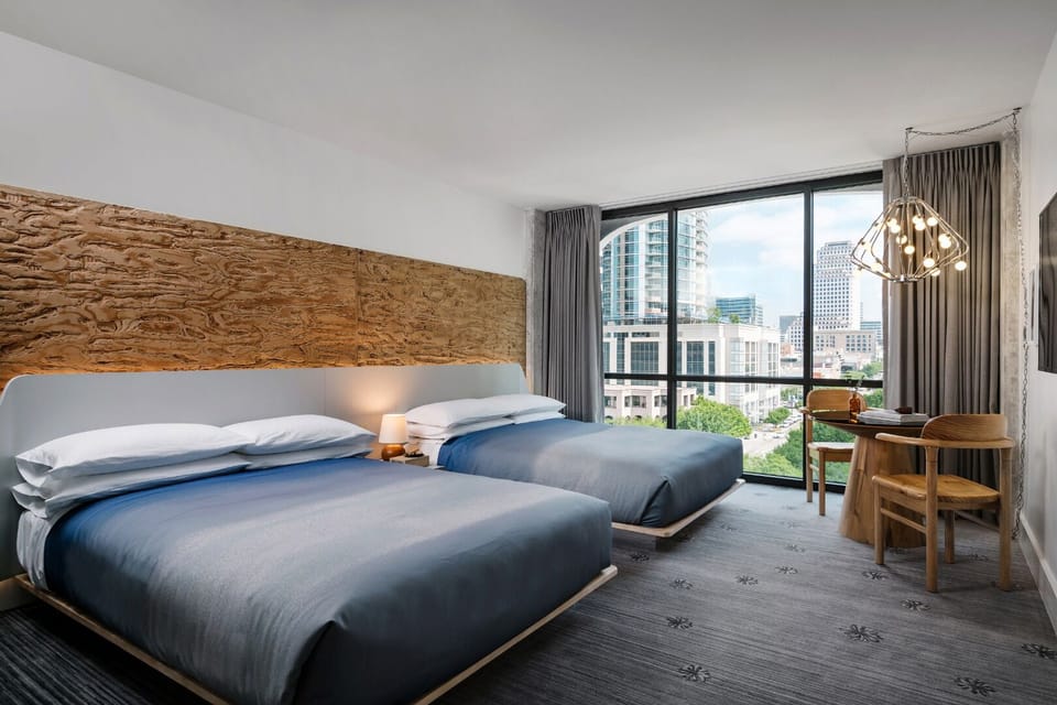 Wake up to city views from crisp, hotel-soft beds.