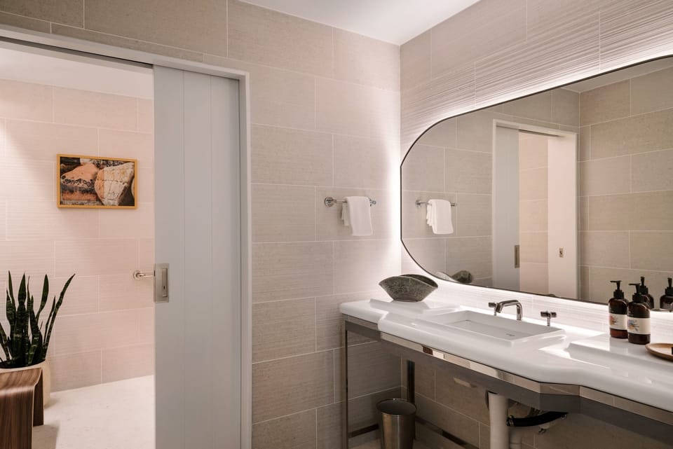 Refresh at a glowing vanity with spa-like calm.