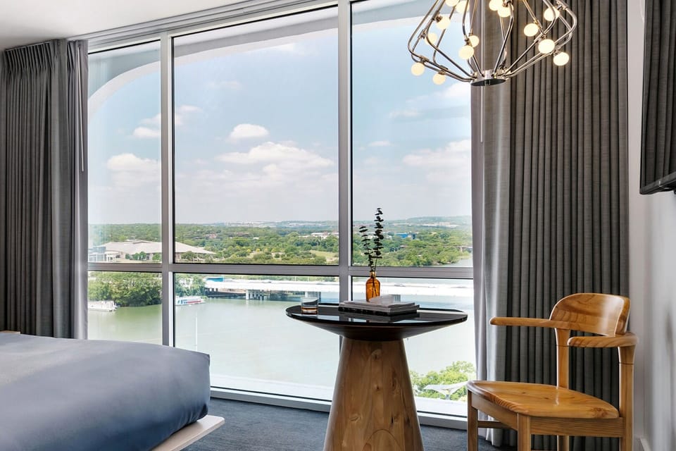 Linger by the window with coffee and breezy lake scenery