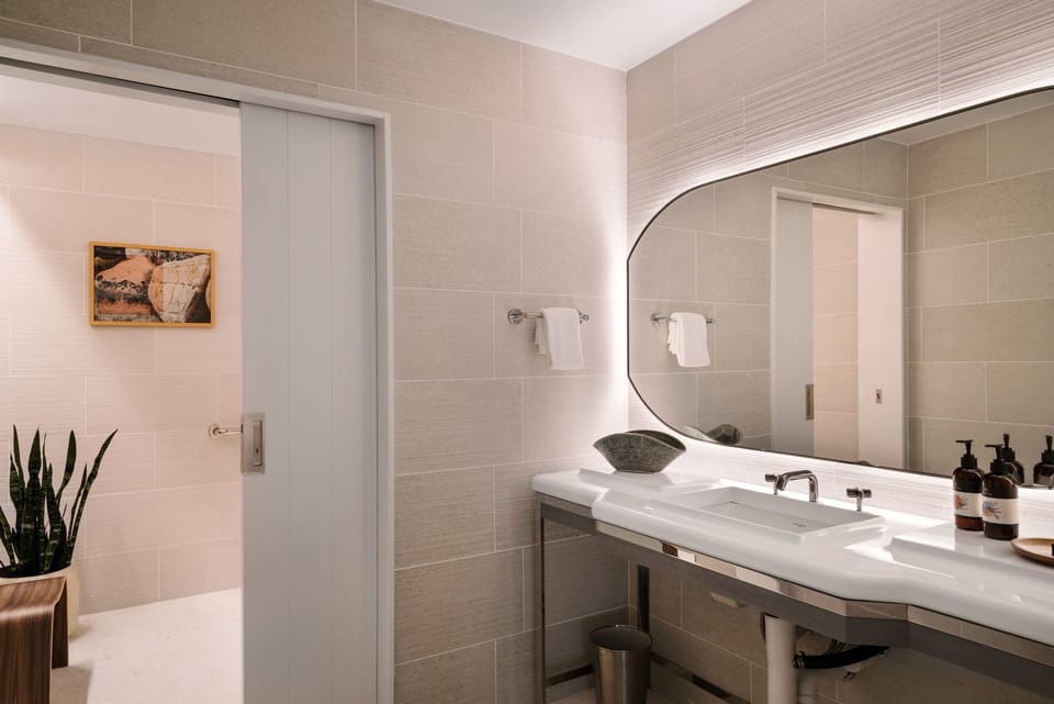 Refresh at a glowing vanity with spa-like calm.
