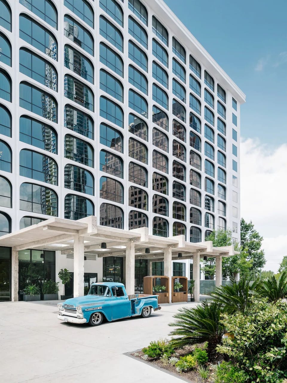 Arrive in style at a striking, design-forward modern facade.