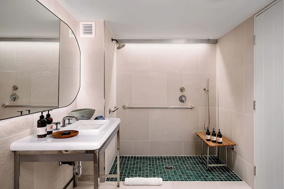 Refresh in a spacious roll-in shower with spa calm.