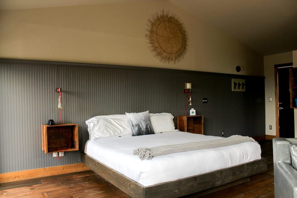 Relax in a spacious, design-forward bedroom with luxe linens.