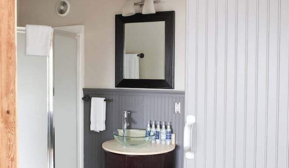 Start mornings at a sleek vanity with hotel-style essentials.