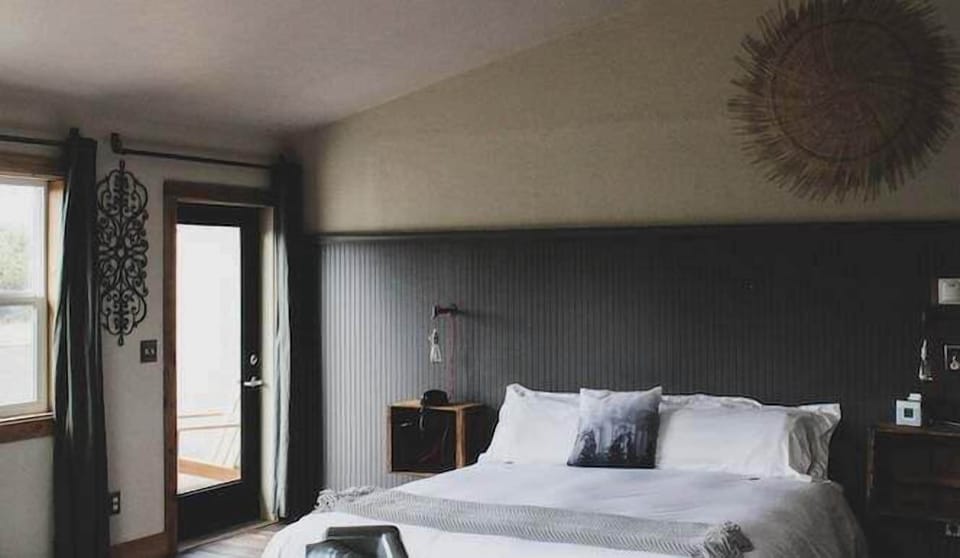 Wake gently to soft light and a calm, airy vibe.