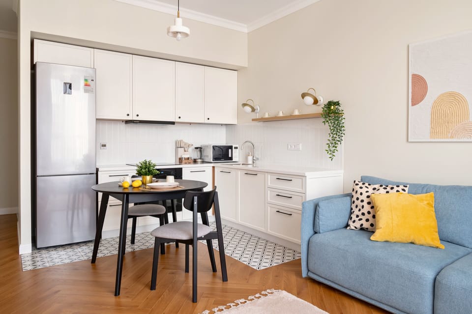 Adjacent to this inviting space is the well-appointed kitchen area.