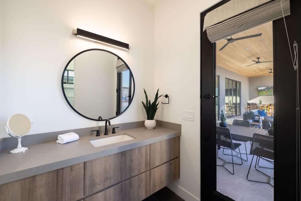 Bedroom Three Ensuite;
Shower;
Single Vanity;
Hair Dryer;
Veranda Access