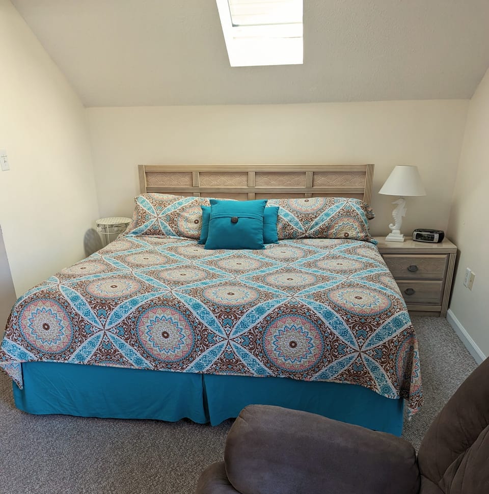2nd floor front bedroom with king bed and available futon.