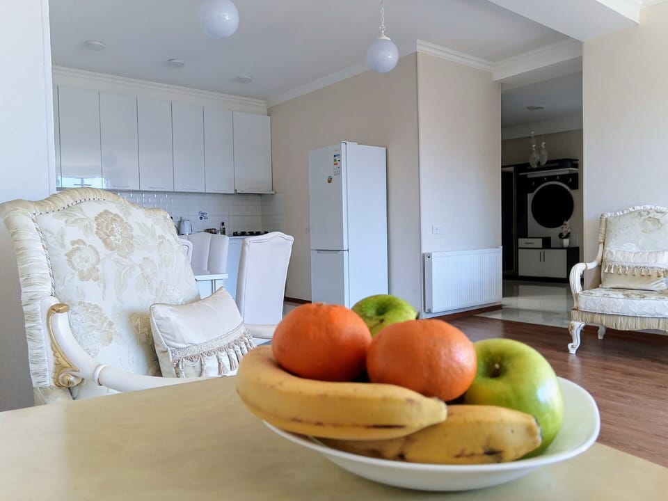 Fruit, Apples, Bananas, Tangerinesand a new angle of the living room to