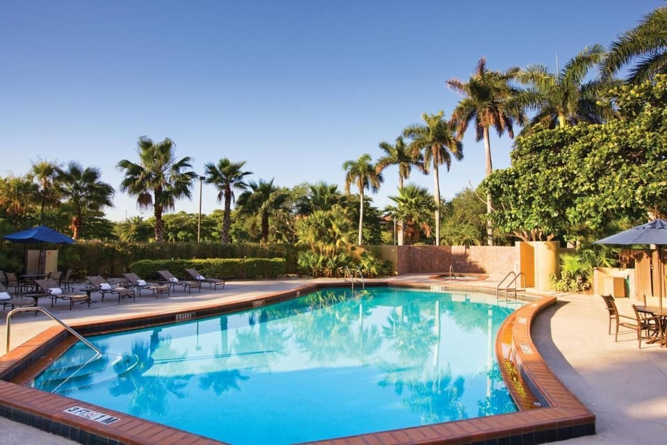 Dive into clear water and relax on cushioned loungers.